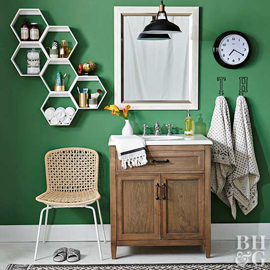 modern green bathroom with black and white accents