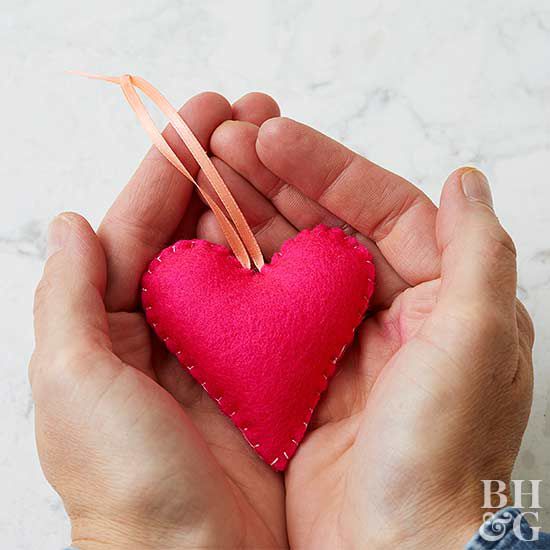 heart ornament in hands