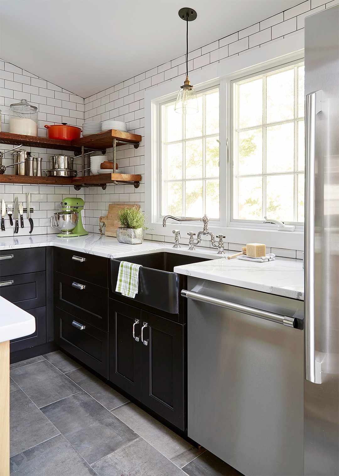 black and white industrial kitchen with apron sink