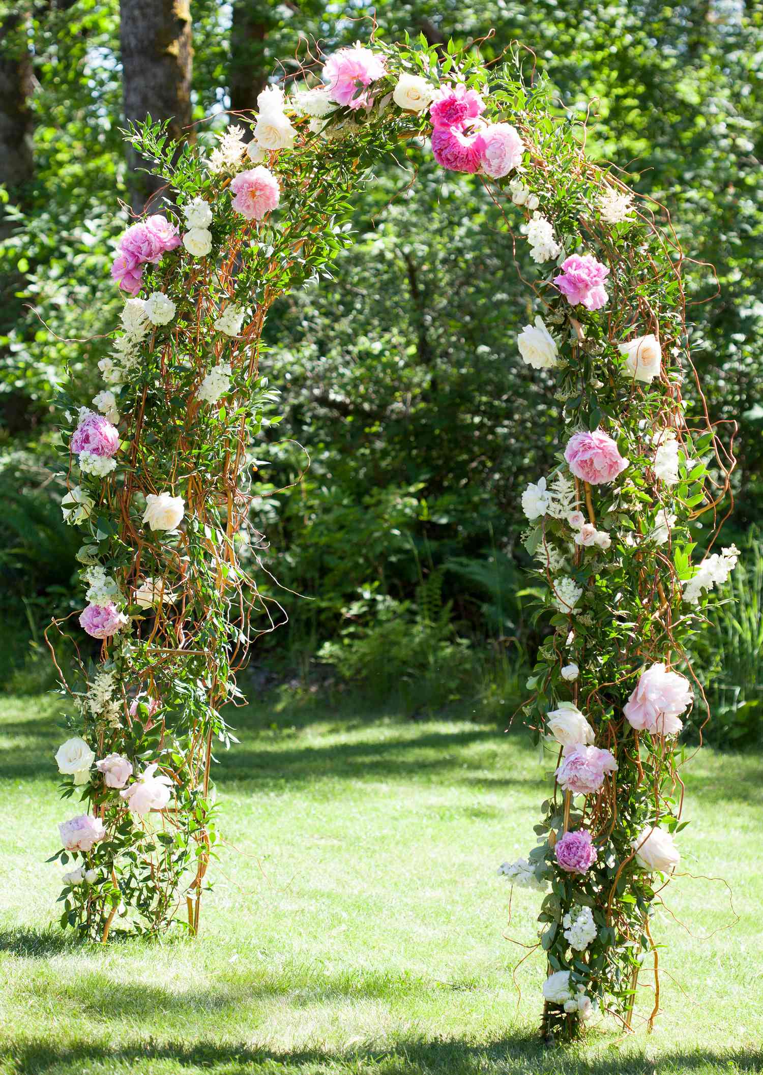 willow arch with roses peonies astilbes italian ruscus