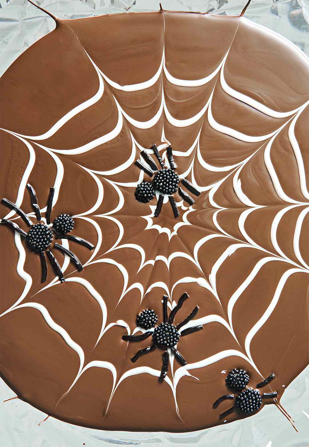 Creepy Cobweb Chocolate Bark with candy spiders