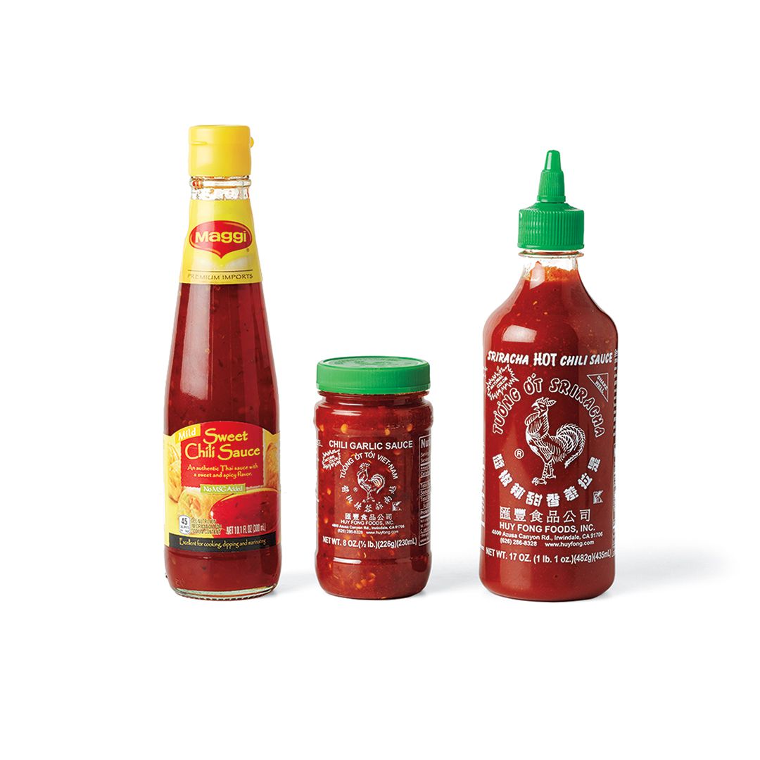 3 bottles of Asian hot sauces in row