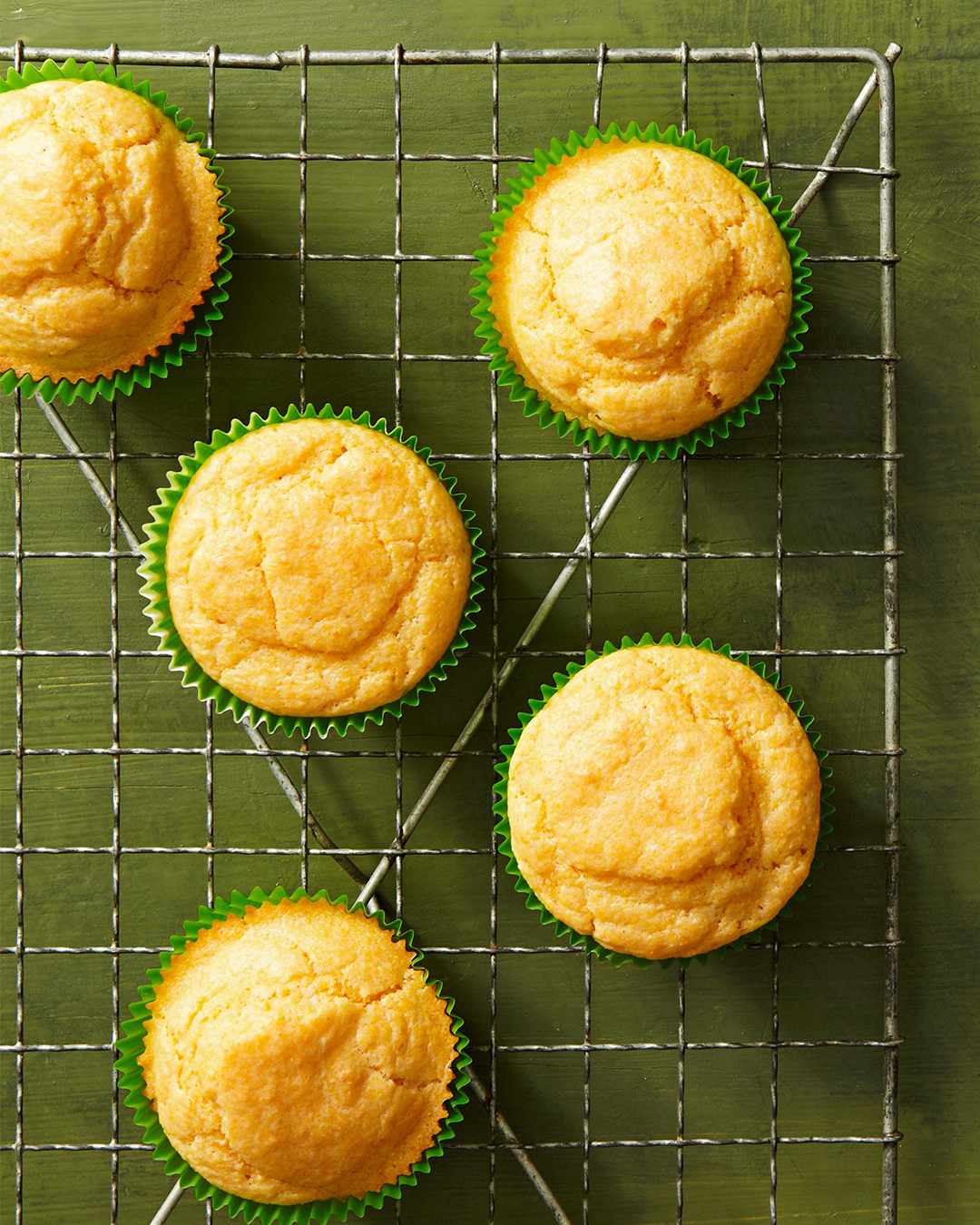 Corn bread muffins on cooling rack