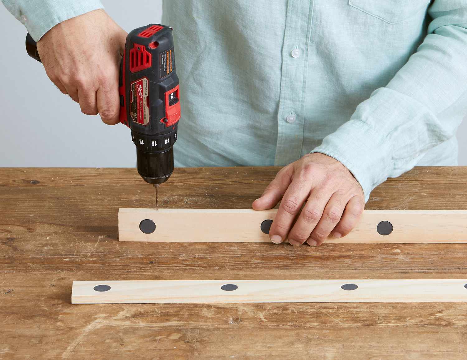 poster holder drill hanger holes on top edge of wood