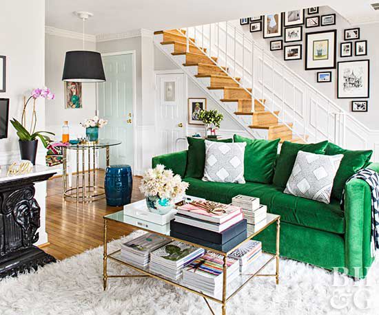 coffee table, shag rug, green velvet sofa