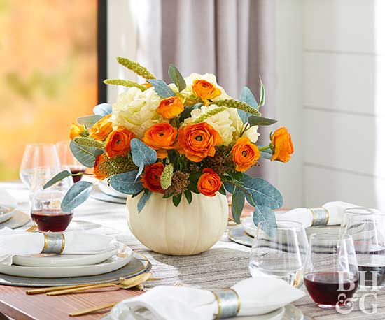 thanksgiving table pumpkin centerpiece with flowers