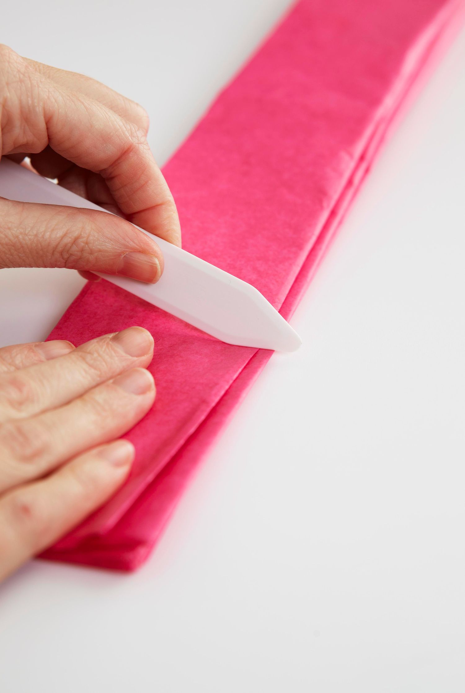 tissue paper pom poms folding edge