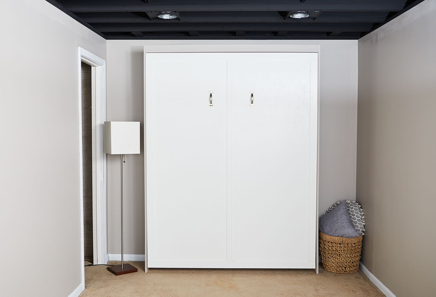 white double door cabinet with pull-out bed