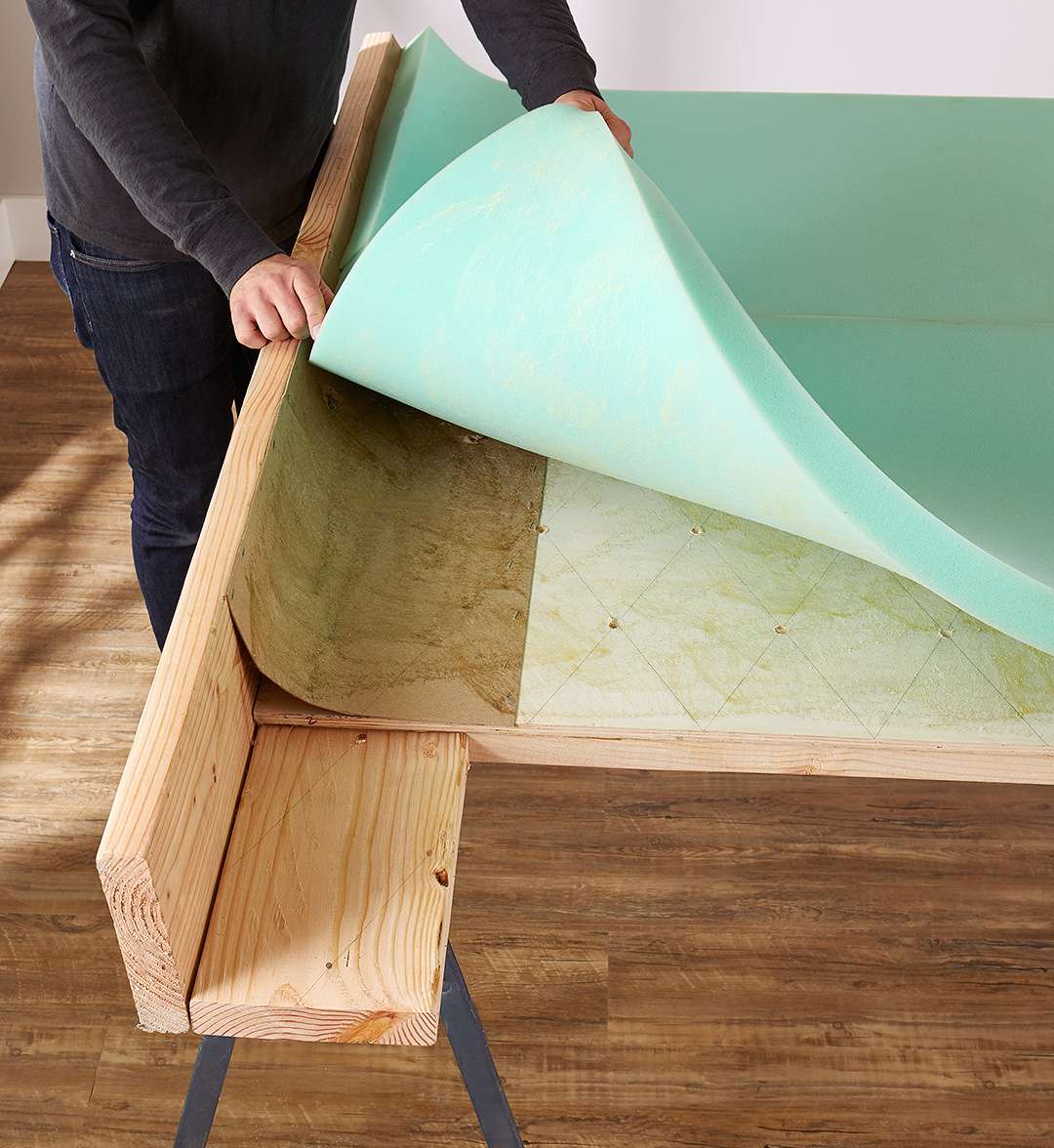 attach foam with spray adhesive to inside of headboard frame
