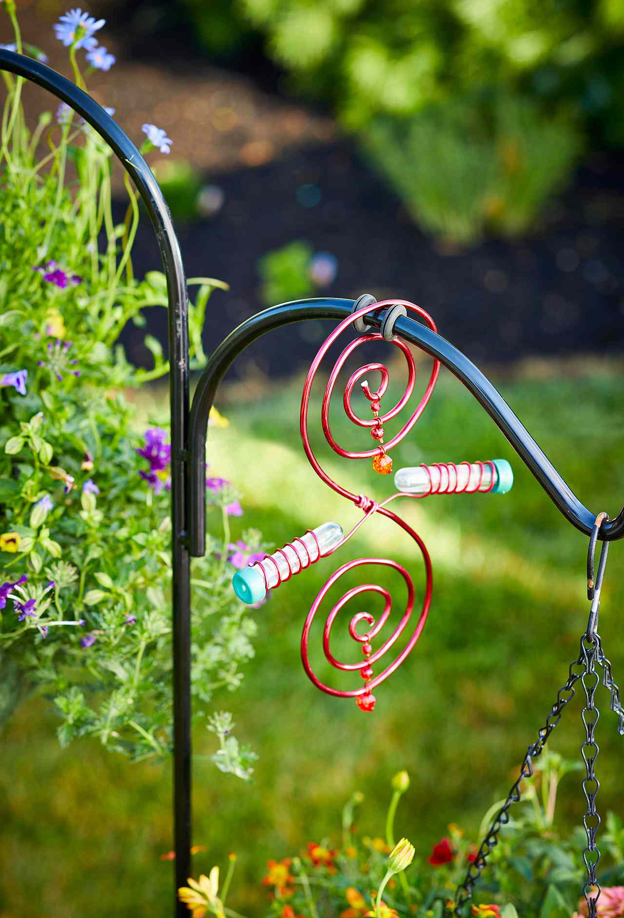 hanging s-shaped hummingbird feeder with tubes