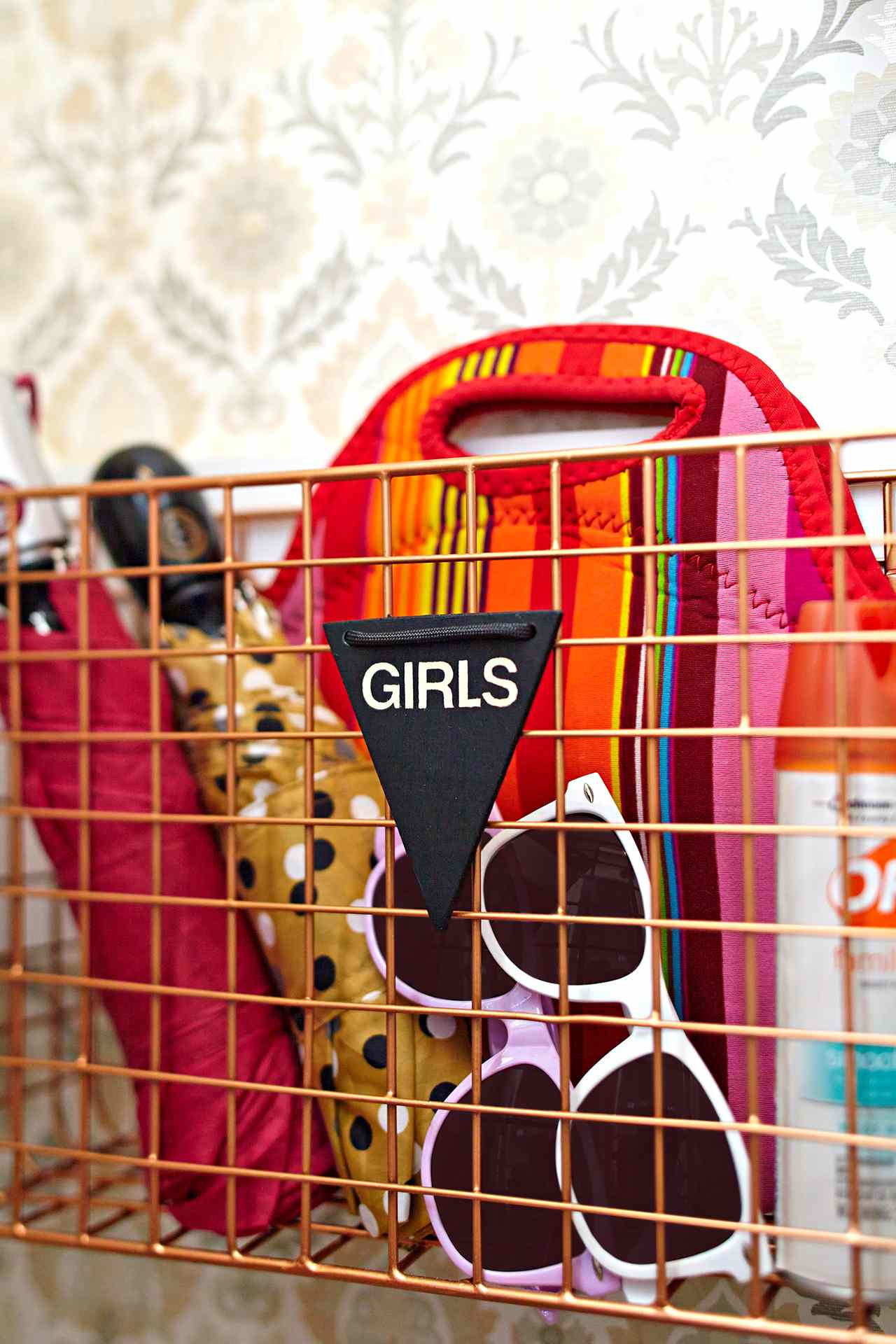 metal basket of girl supplies