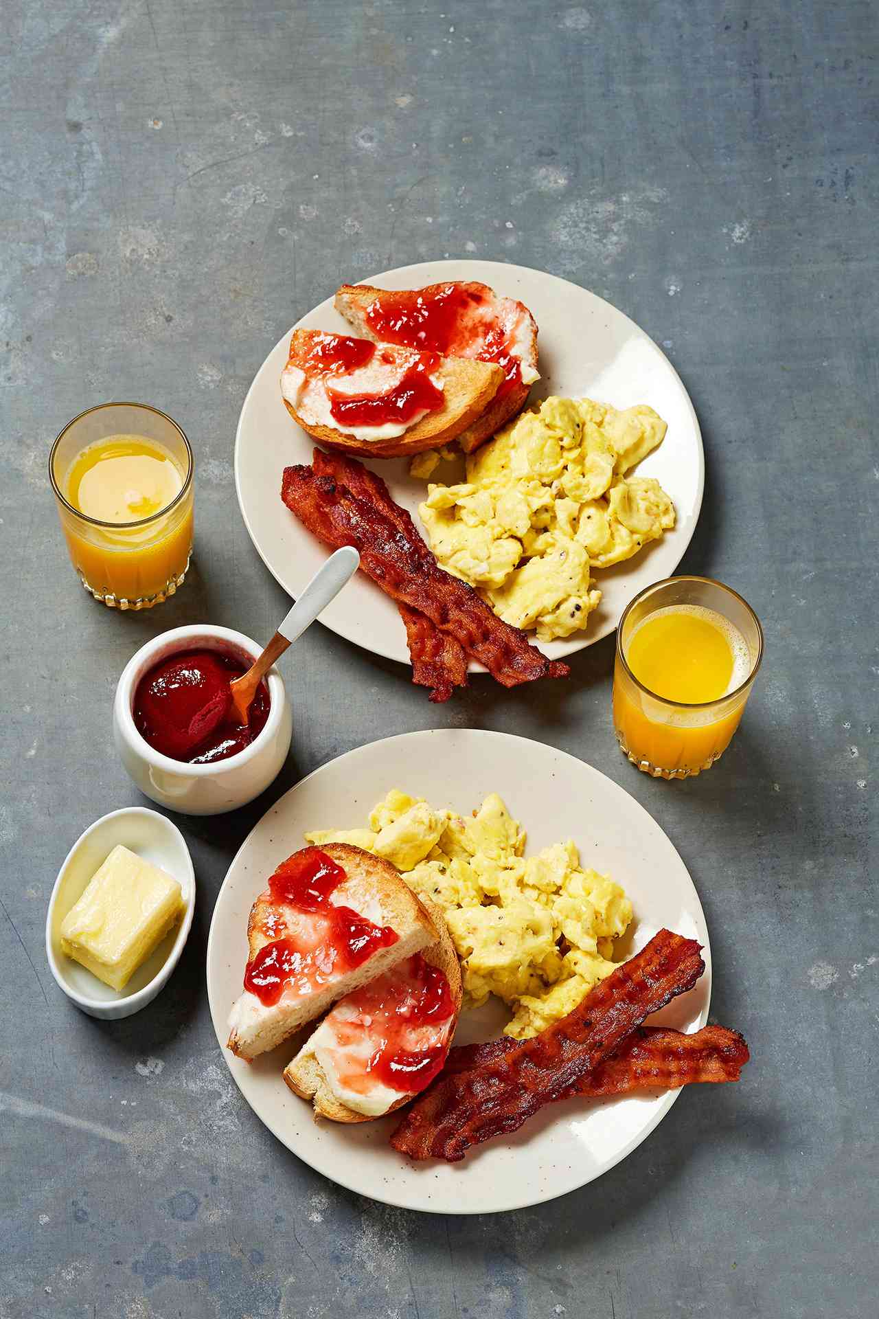 Scrambled Eggs, bacon, and toast breakfast