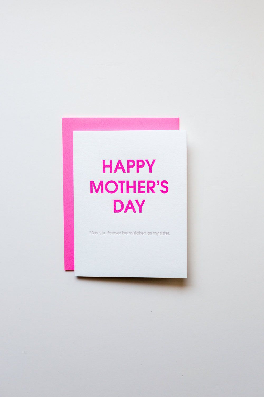 mother's day card says may you forever be mistaken as my sister