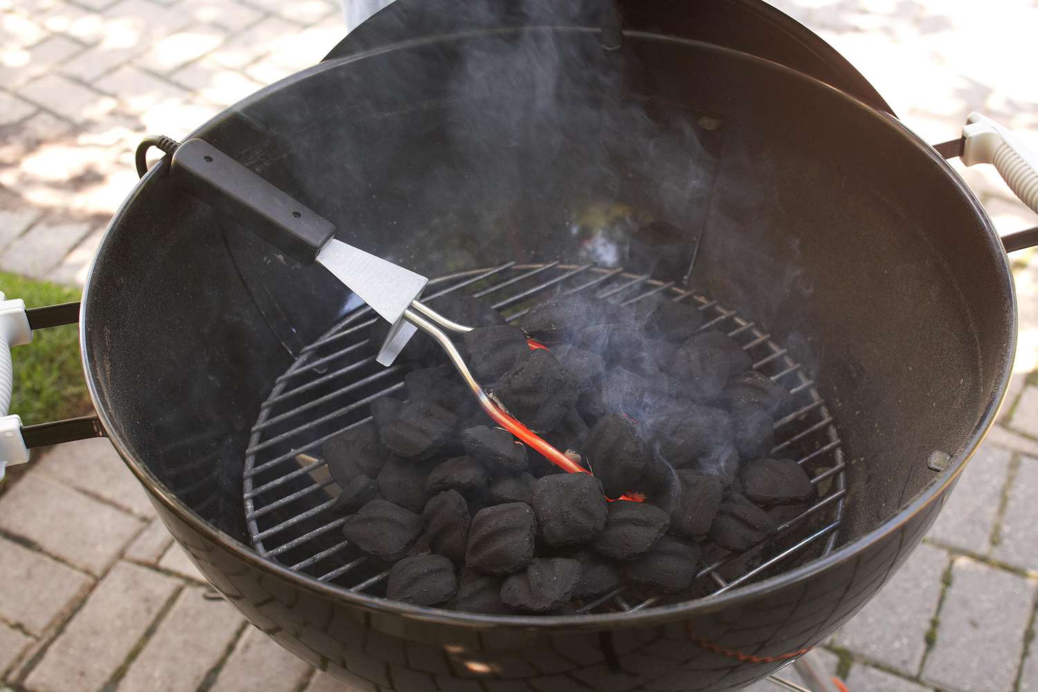 using electric starting to light charcoal grill