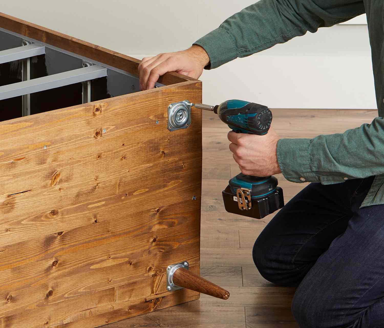 electric drill used to install dresser feet