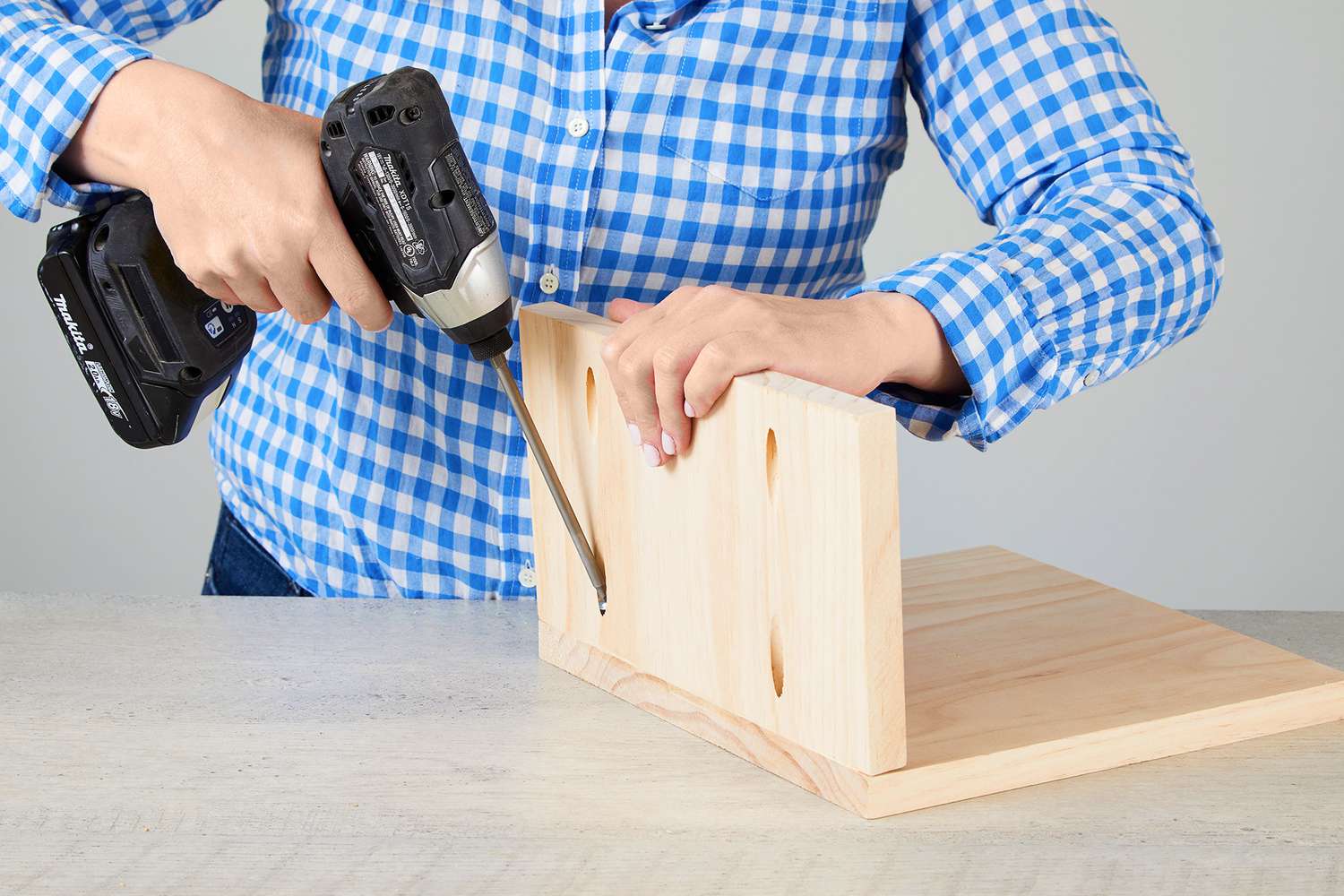 secure phone caddy to piece with pocket screws