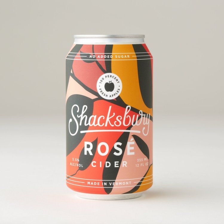 Can of rose cider on a gray background