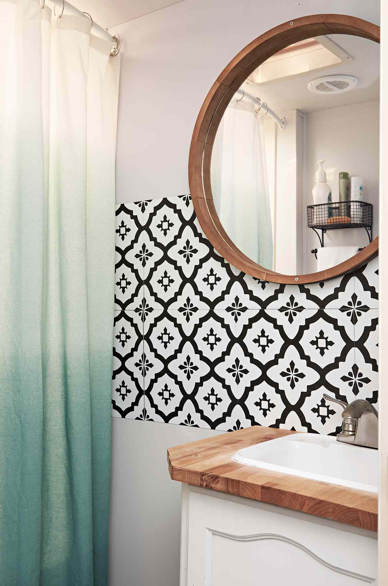 black and white wallpaper and ombre shower curtain