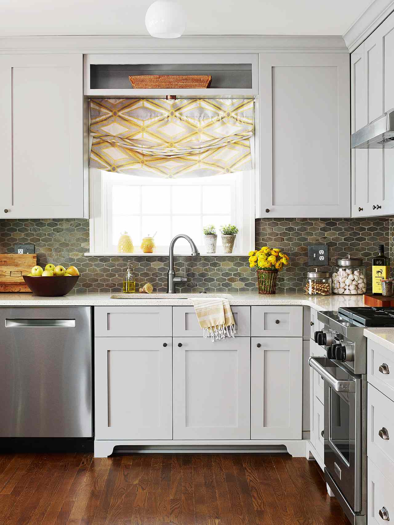 low-contrast gray kitchen with pops of yellow
