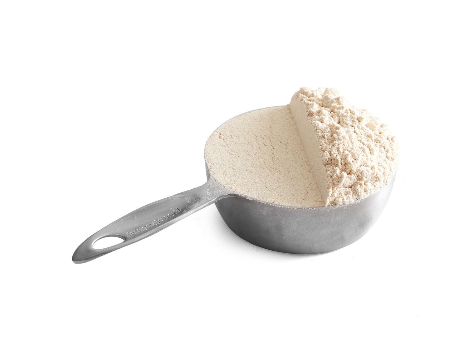 whole wheat flour in measuring cup
