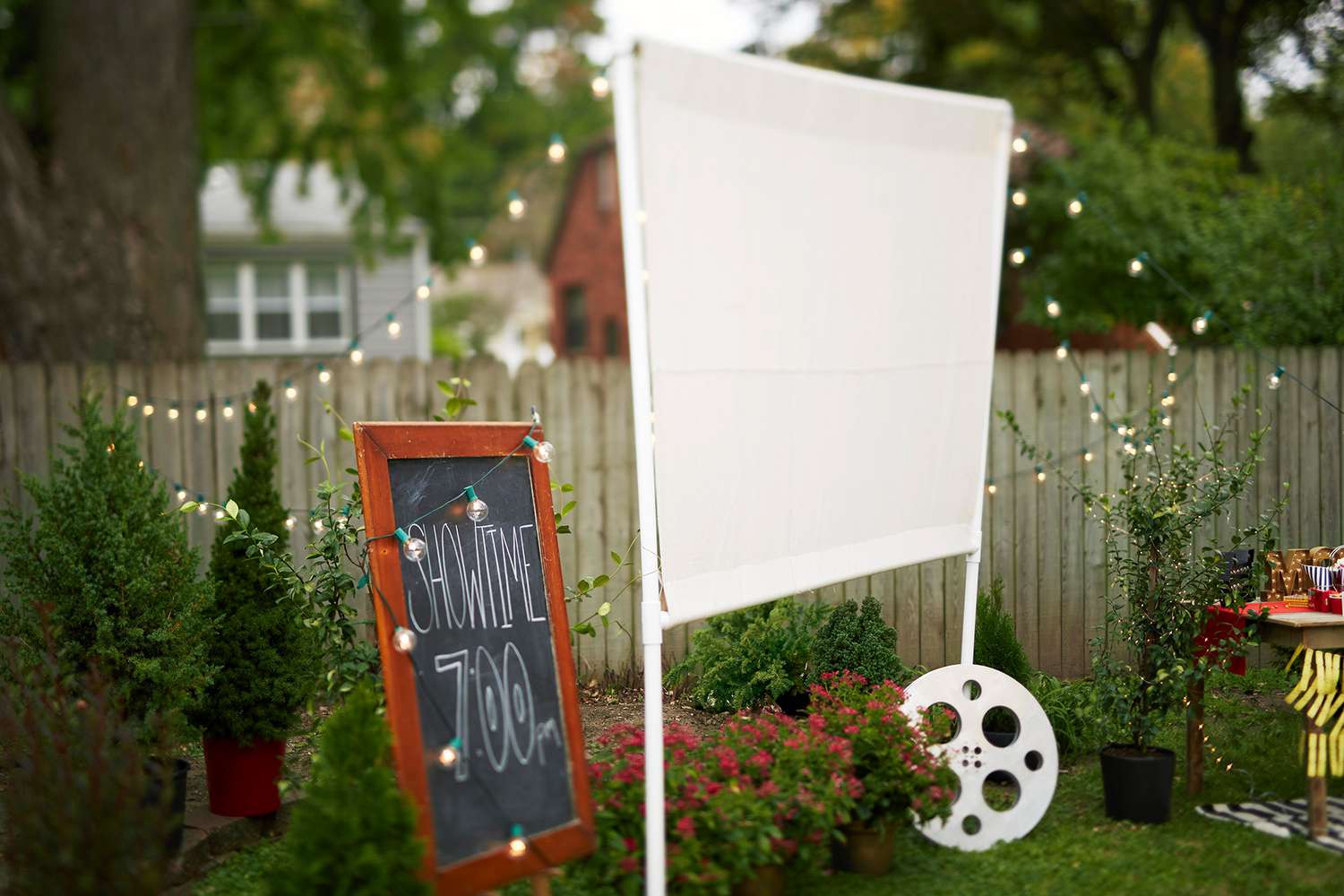 backyard movie screen projector reel showtime sign