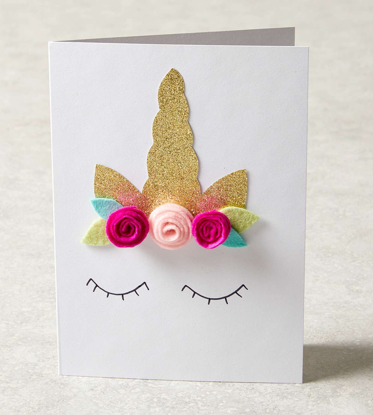 Homemade unicorn card with felt flowers
