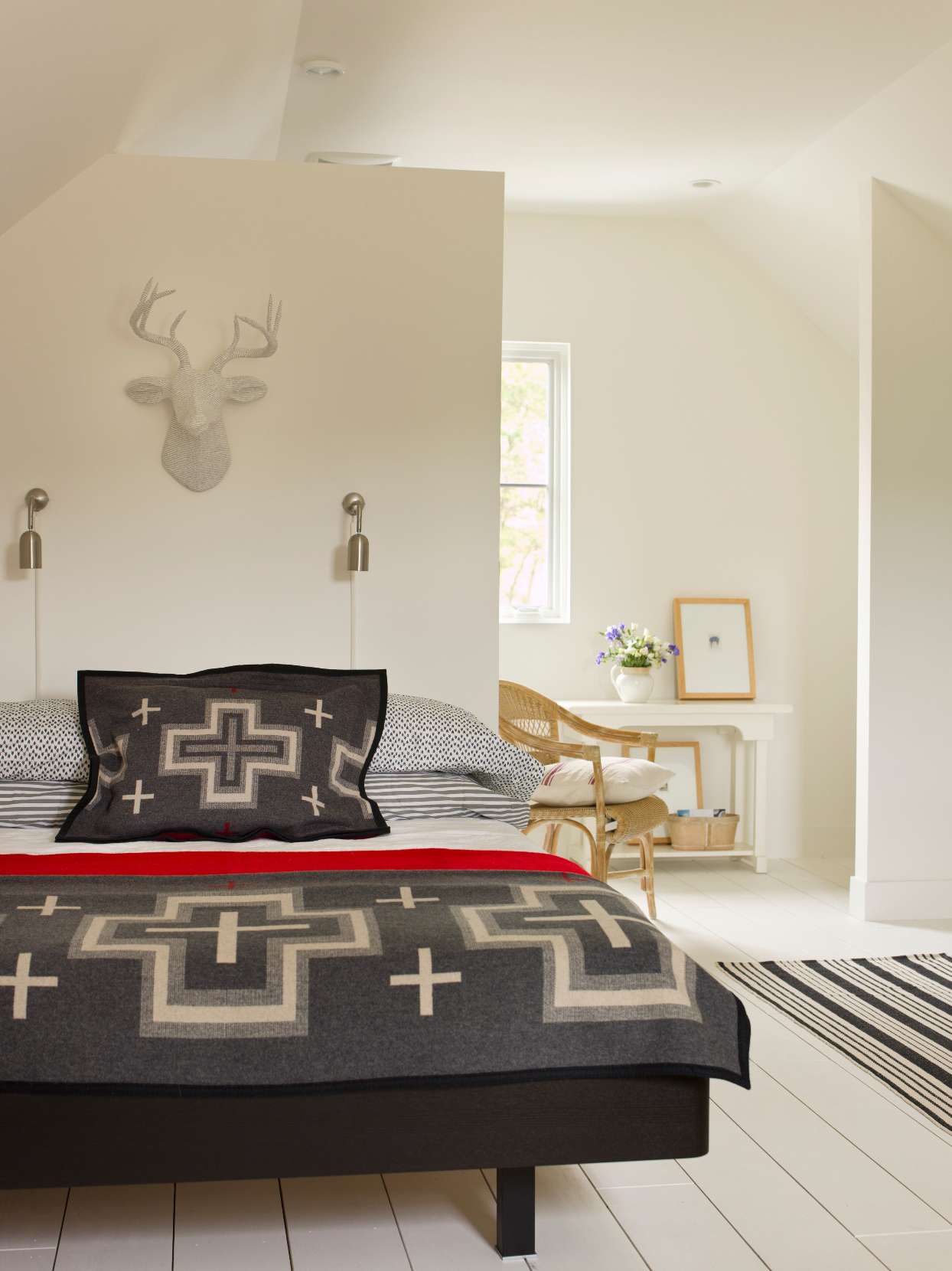 Modern eclectic bedroom with black and red accents