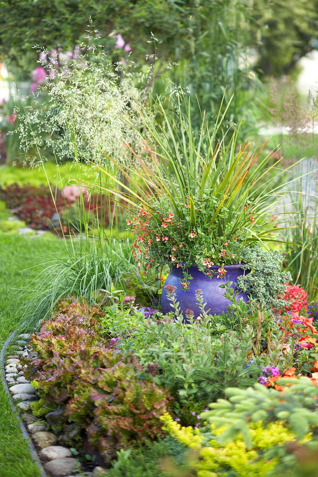 garden bed with blue pot