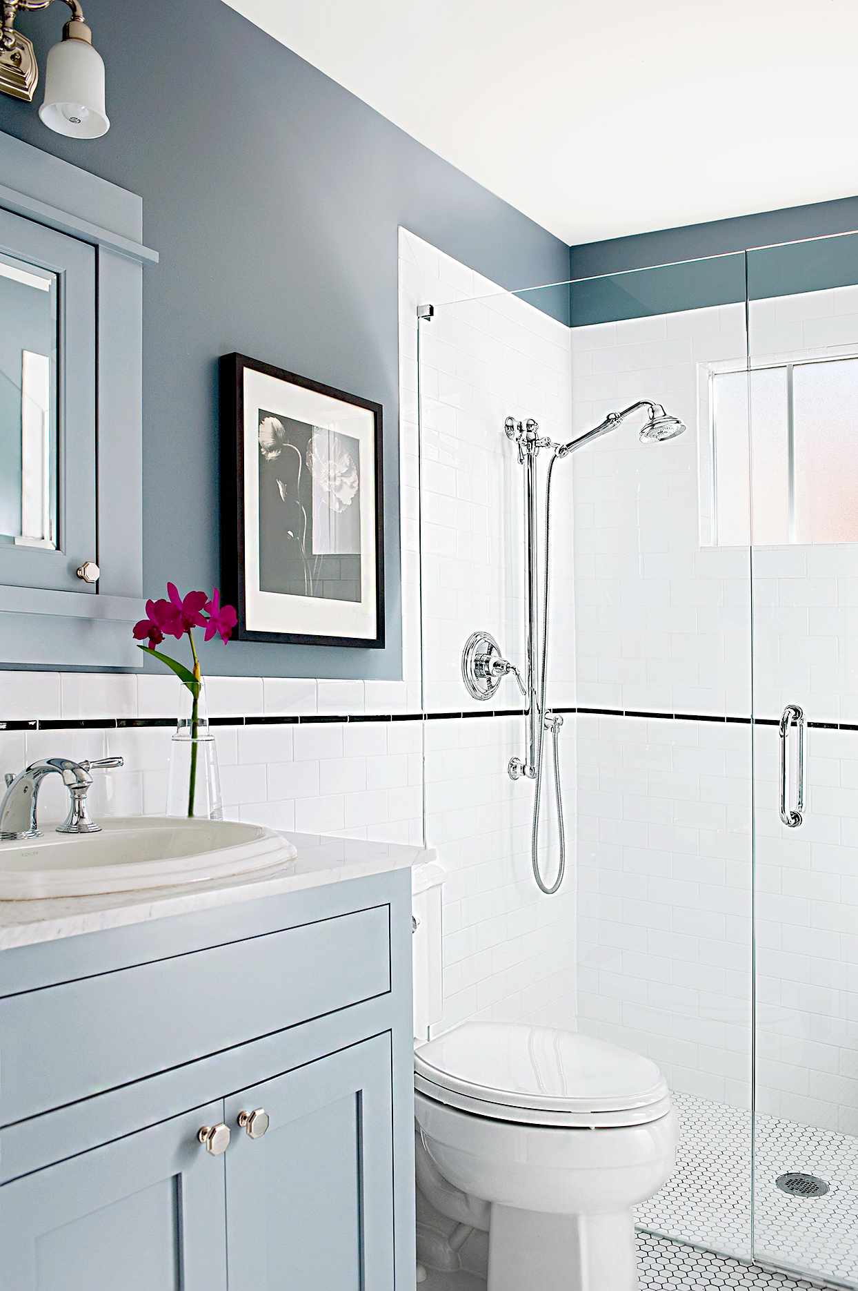Bathroom with gray and white color theme