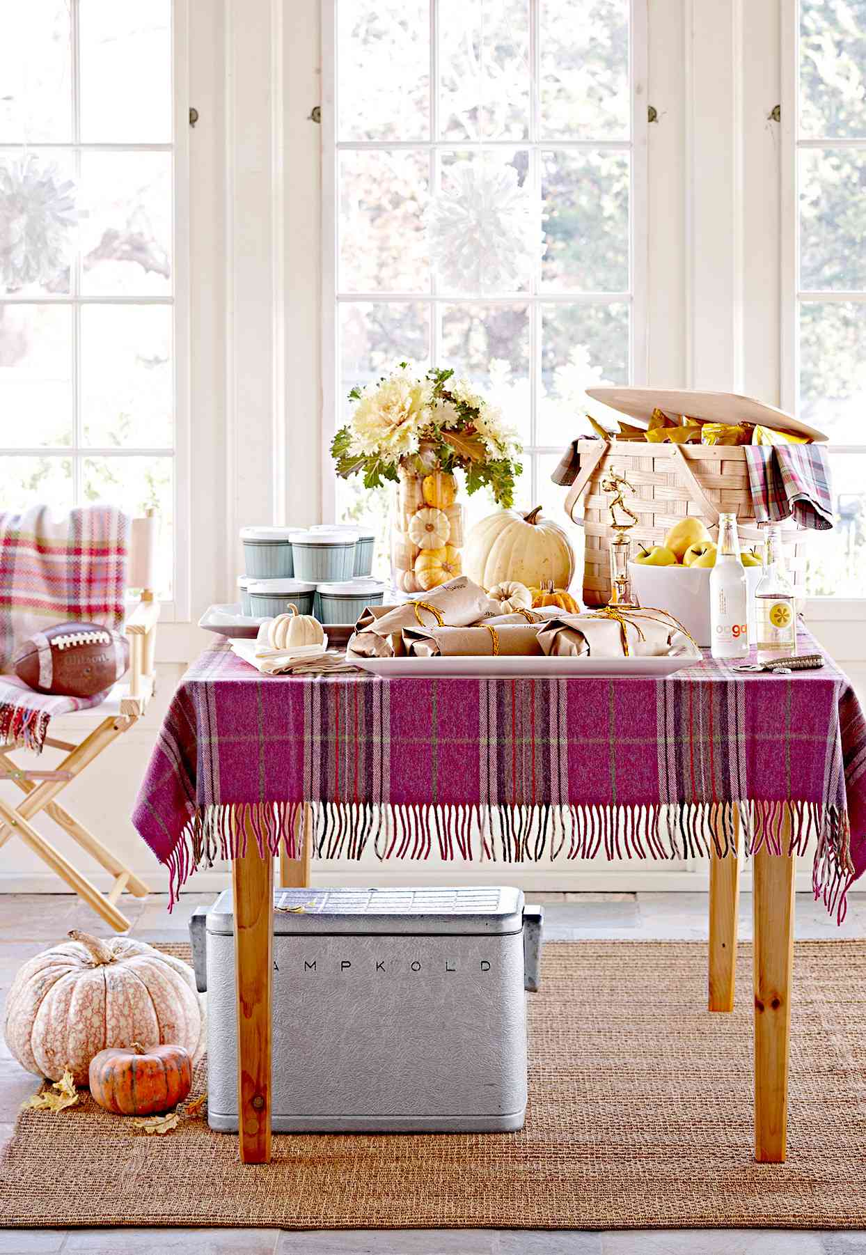 Table with picnic setting and pumpkins