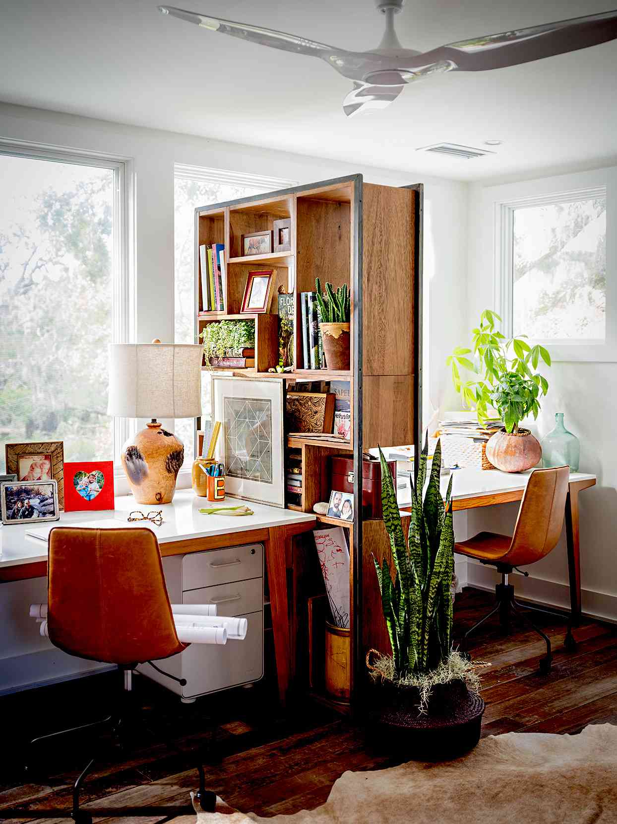 Office area with wooden shelf divider