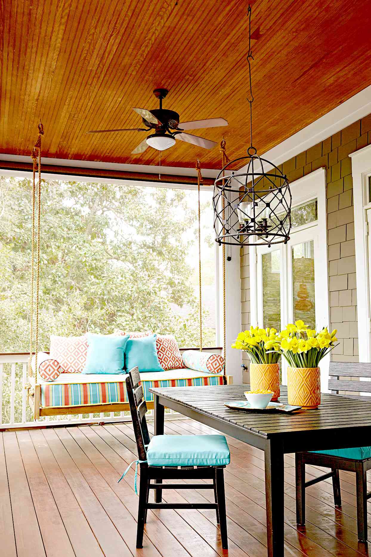 Porch with dining area and swing seating