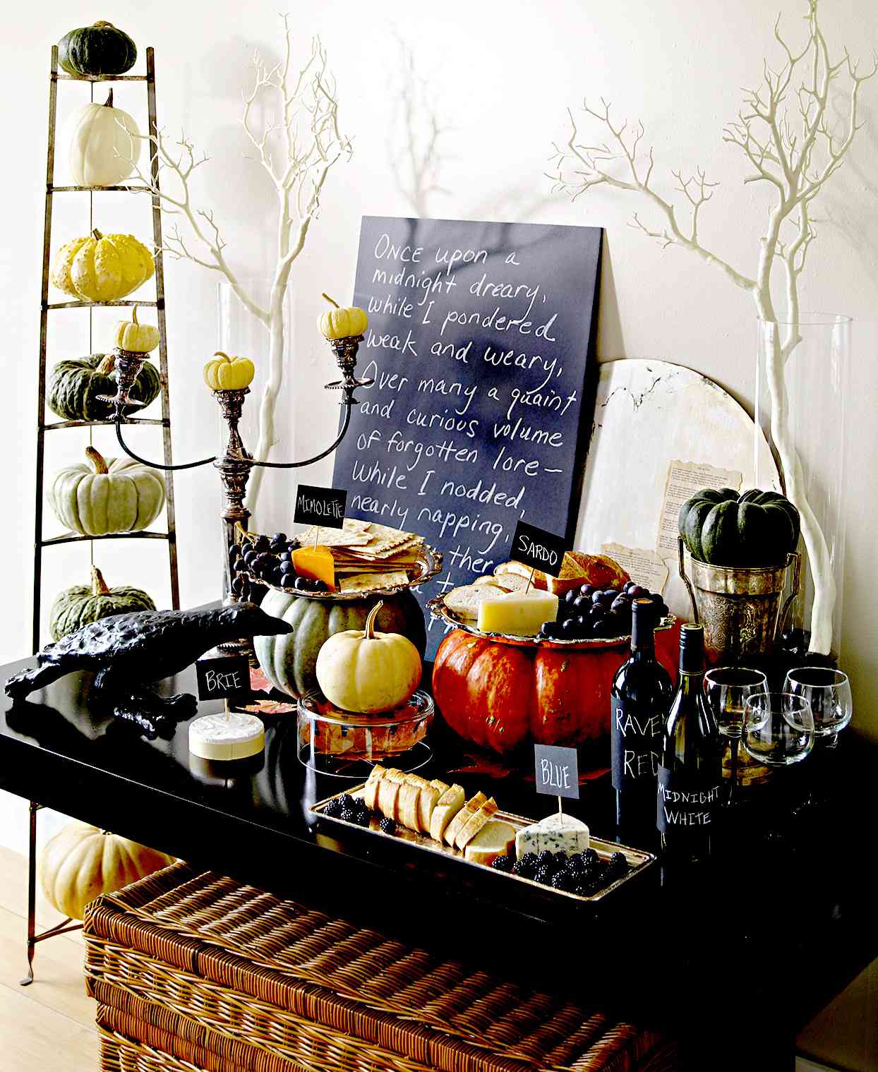 Black table with fall décor and blackboard