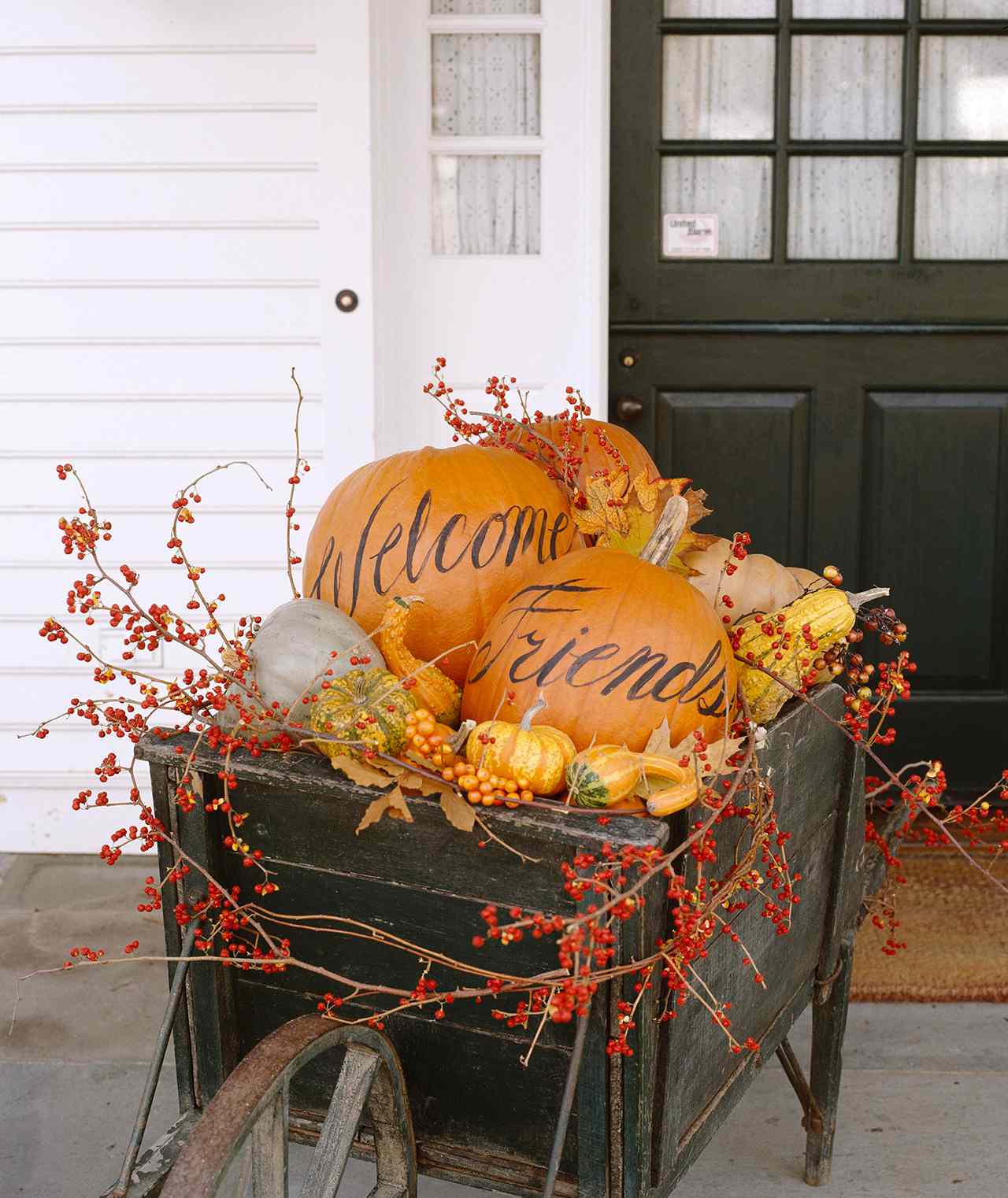 welcome friends fall pumpkin porch display