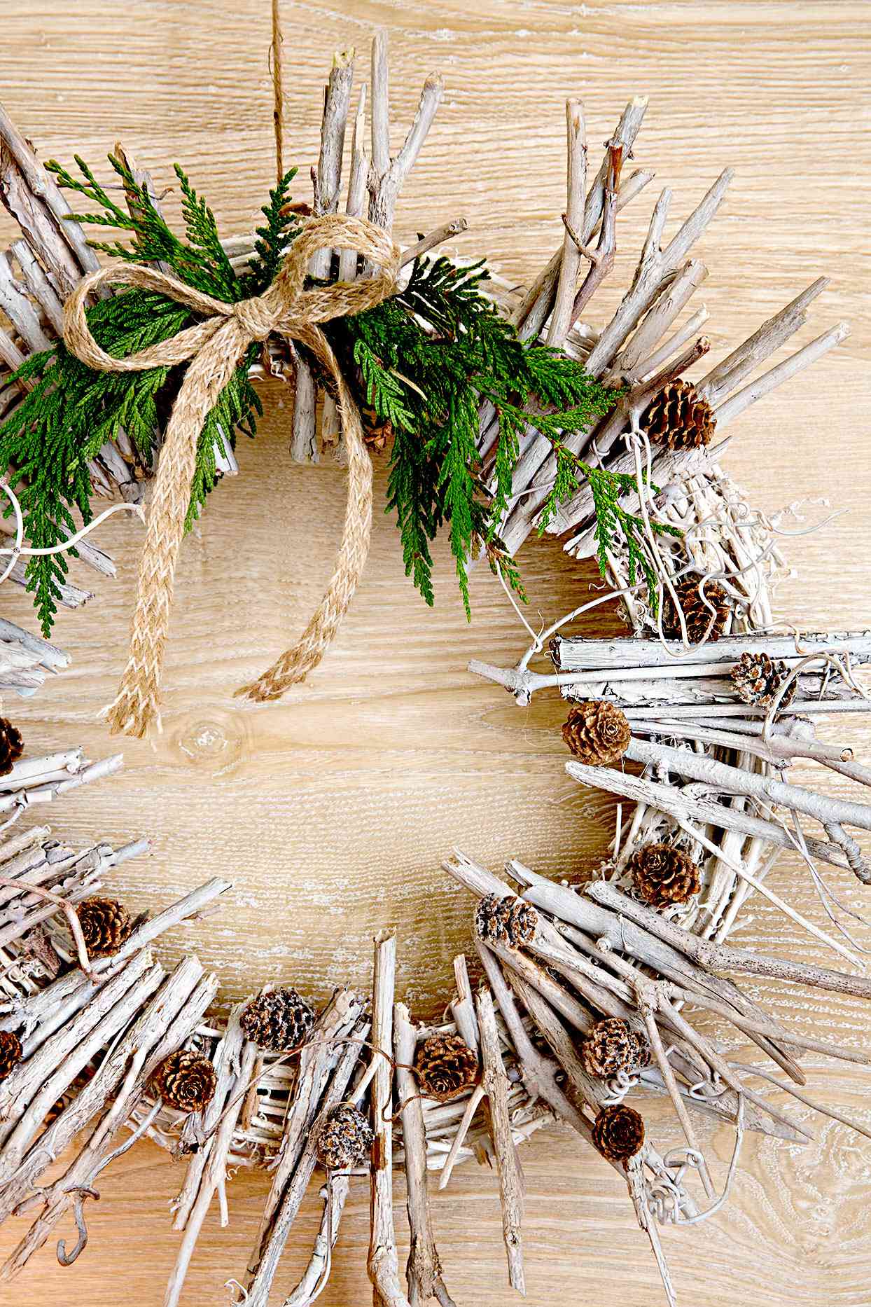 Wreath made of branches and pinecones