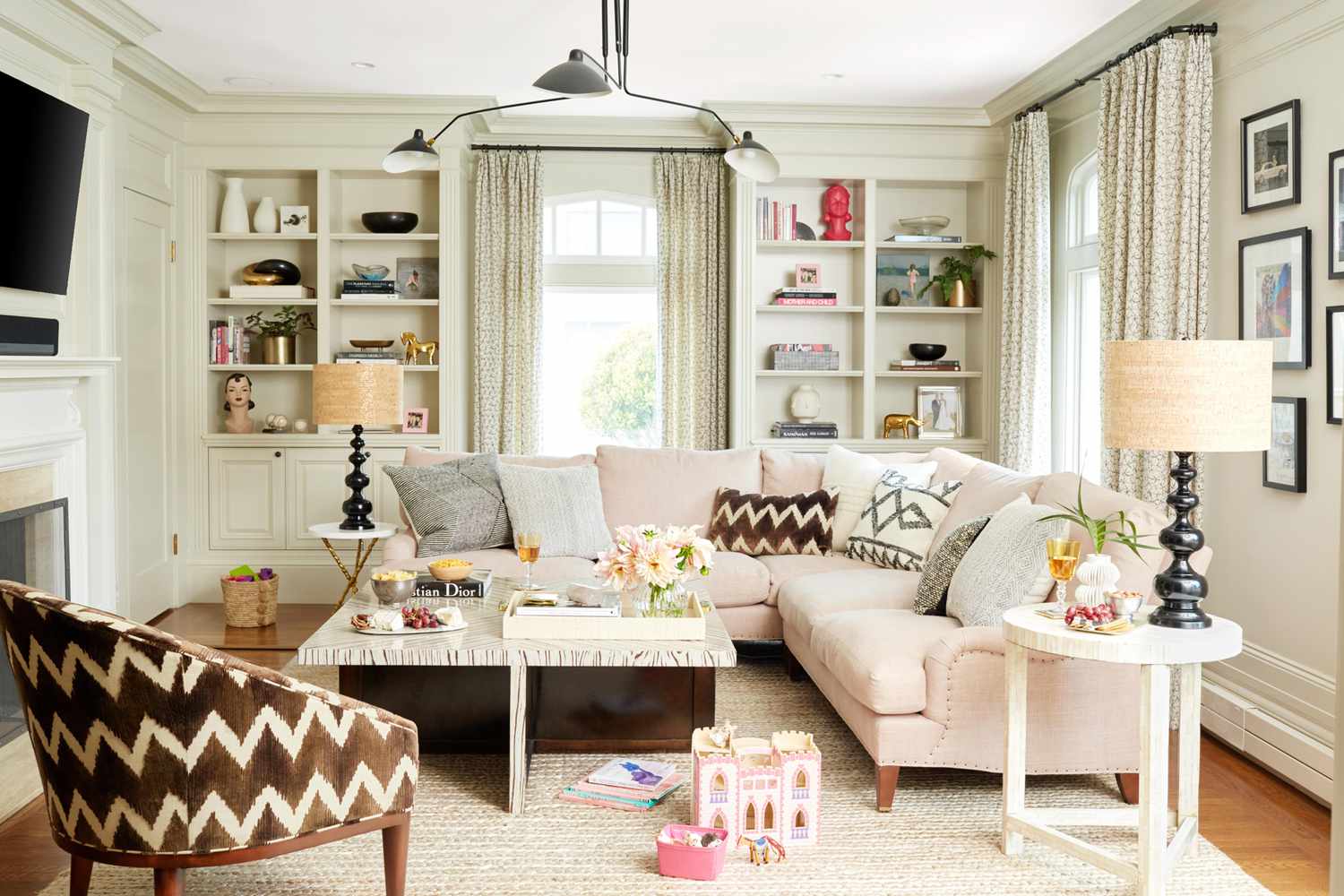brown white pink living room set up