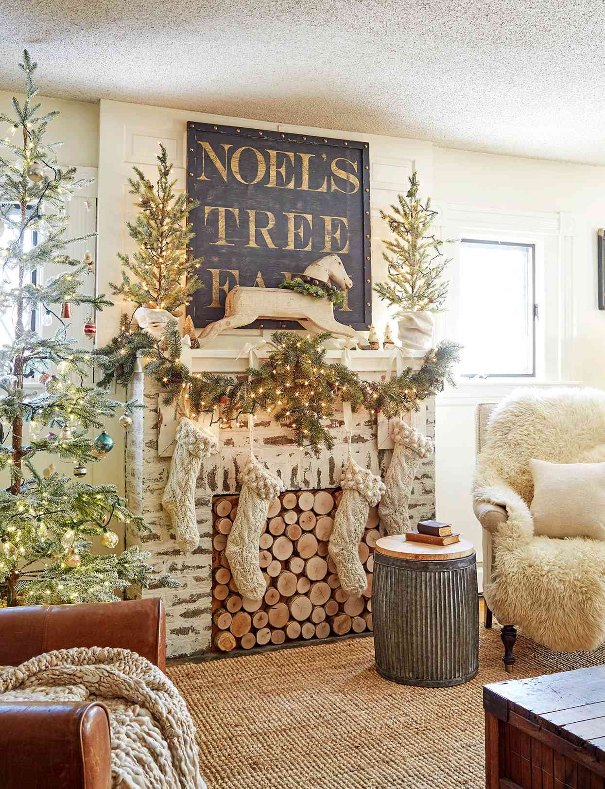 farmhouse living room decorated for Christmas with large black artwork