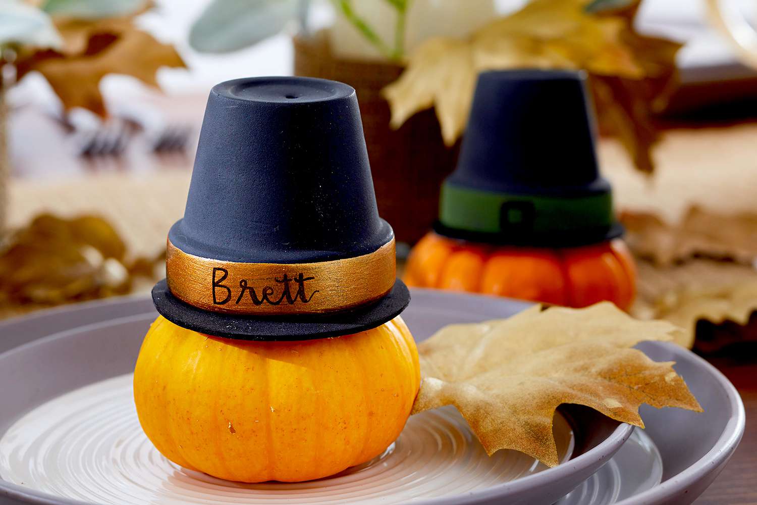 Pumpkin table markers with hats