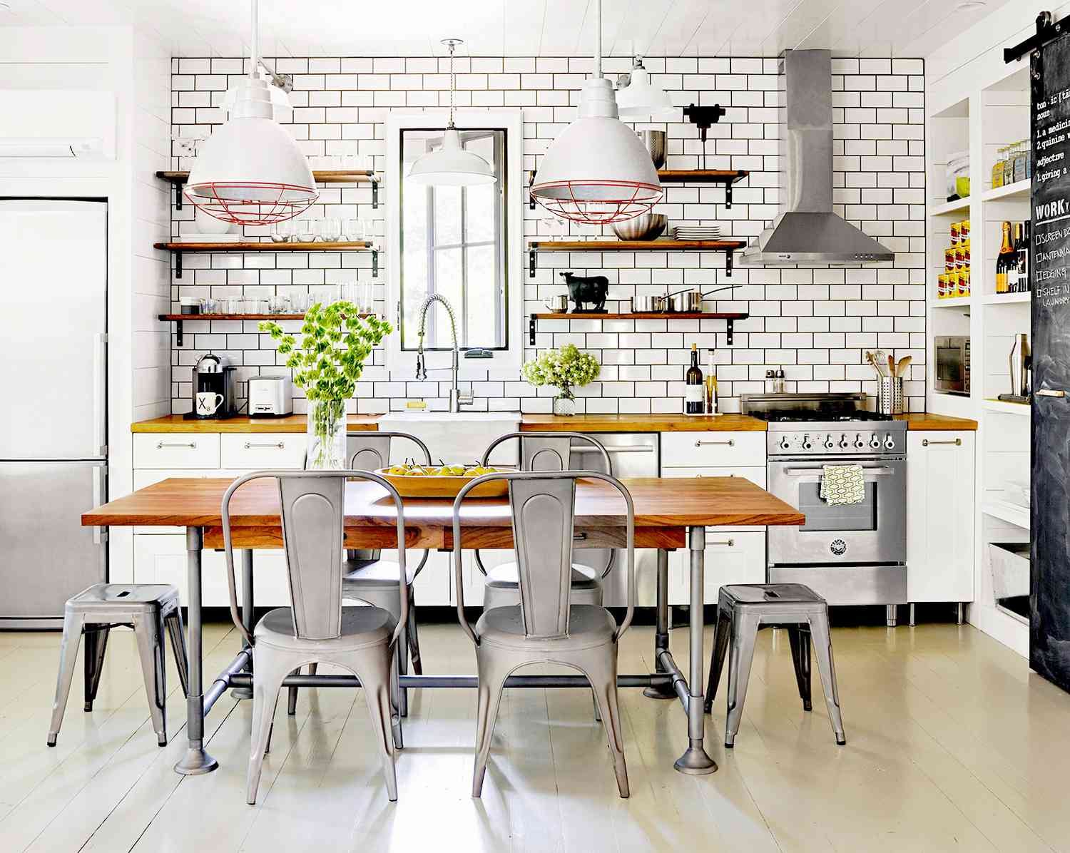 Kitchen with white brick and dining room seating