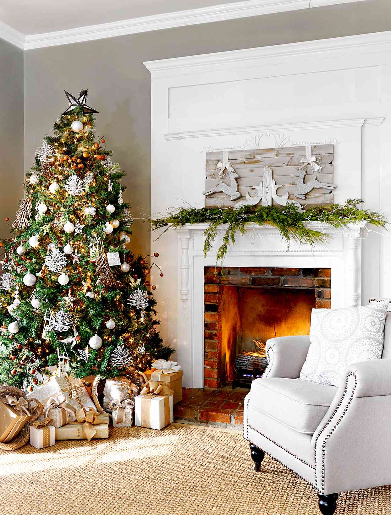 Living room with Christmas tree and white chair