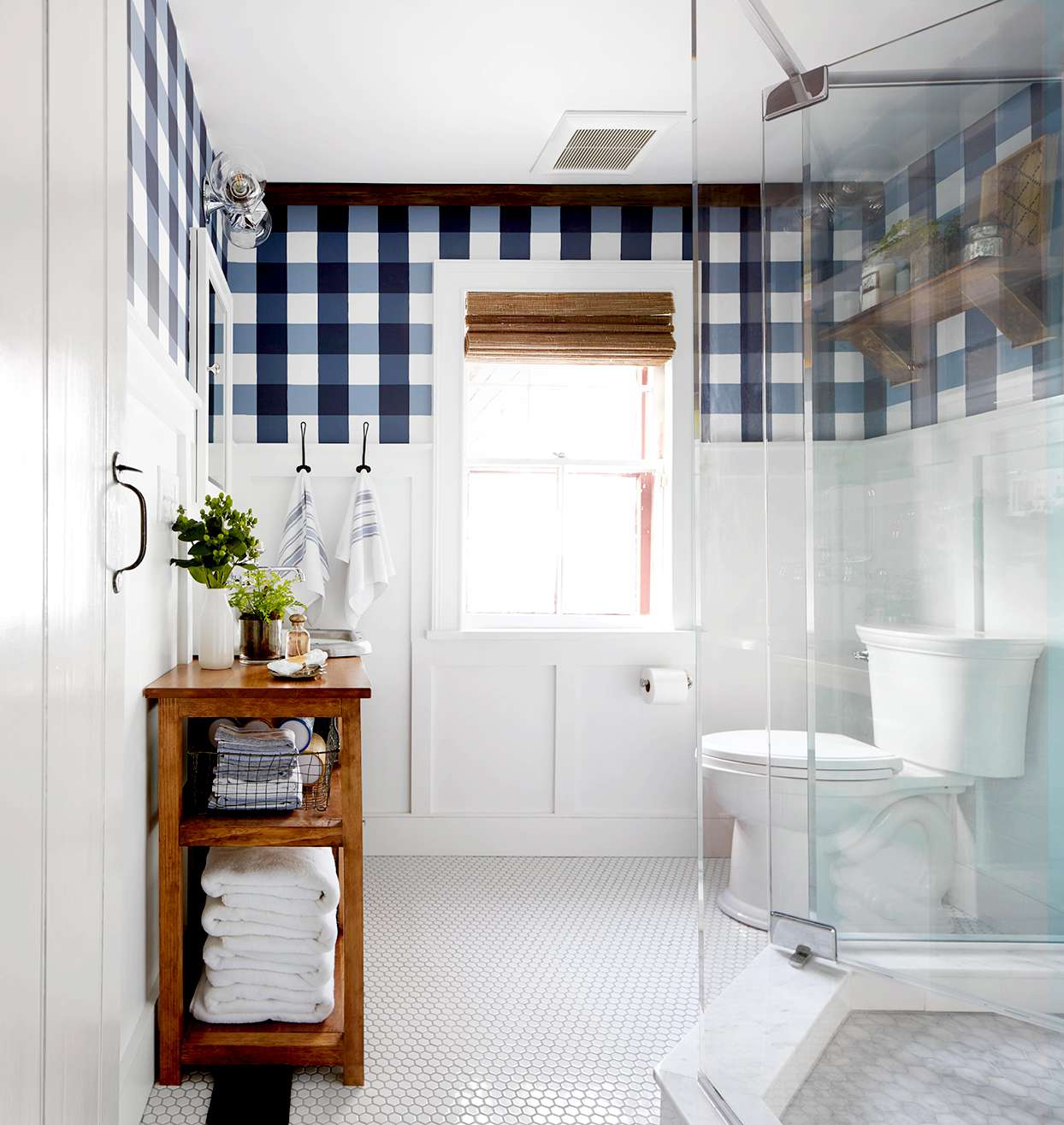 Bathroom with blue and white plaid wallpaper