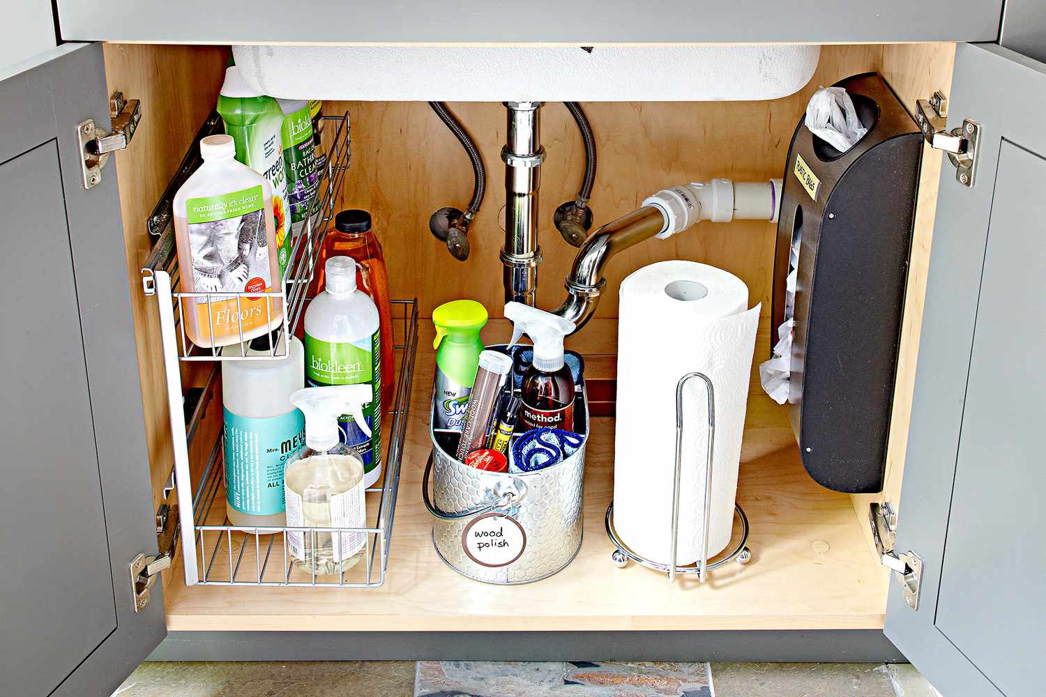 Cleaning supplies under a sink