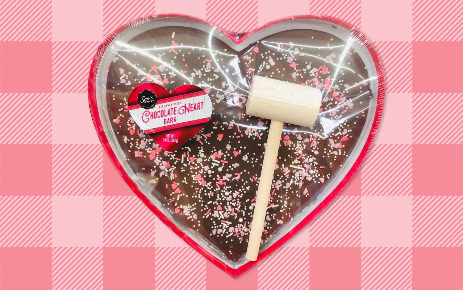 Packaged chocolate heart with a mallet for breaking