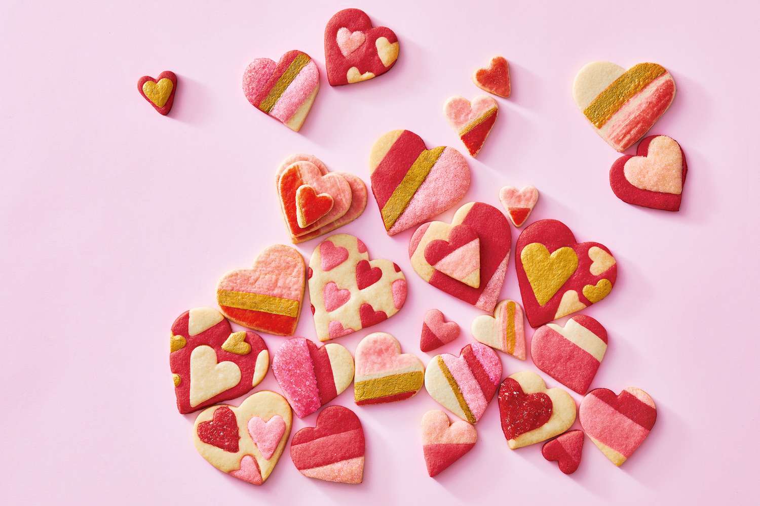 pink gold and red heart-shaped cookies