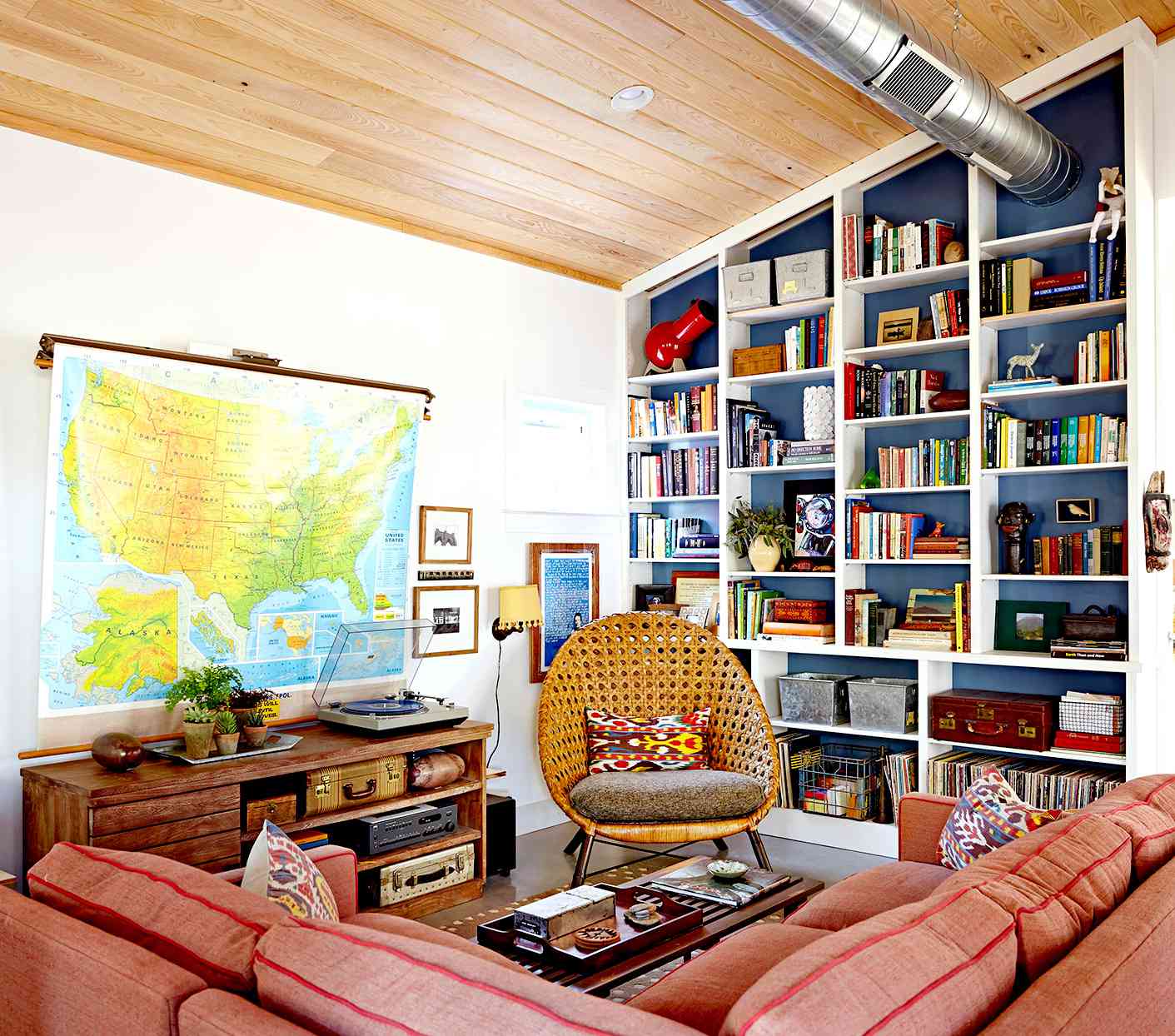 Living room with bookshelves and large USA map