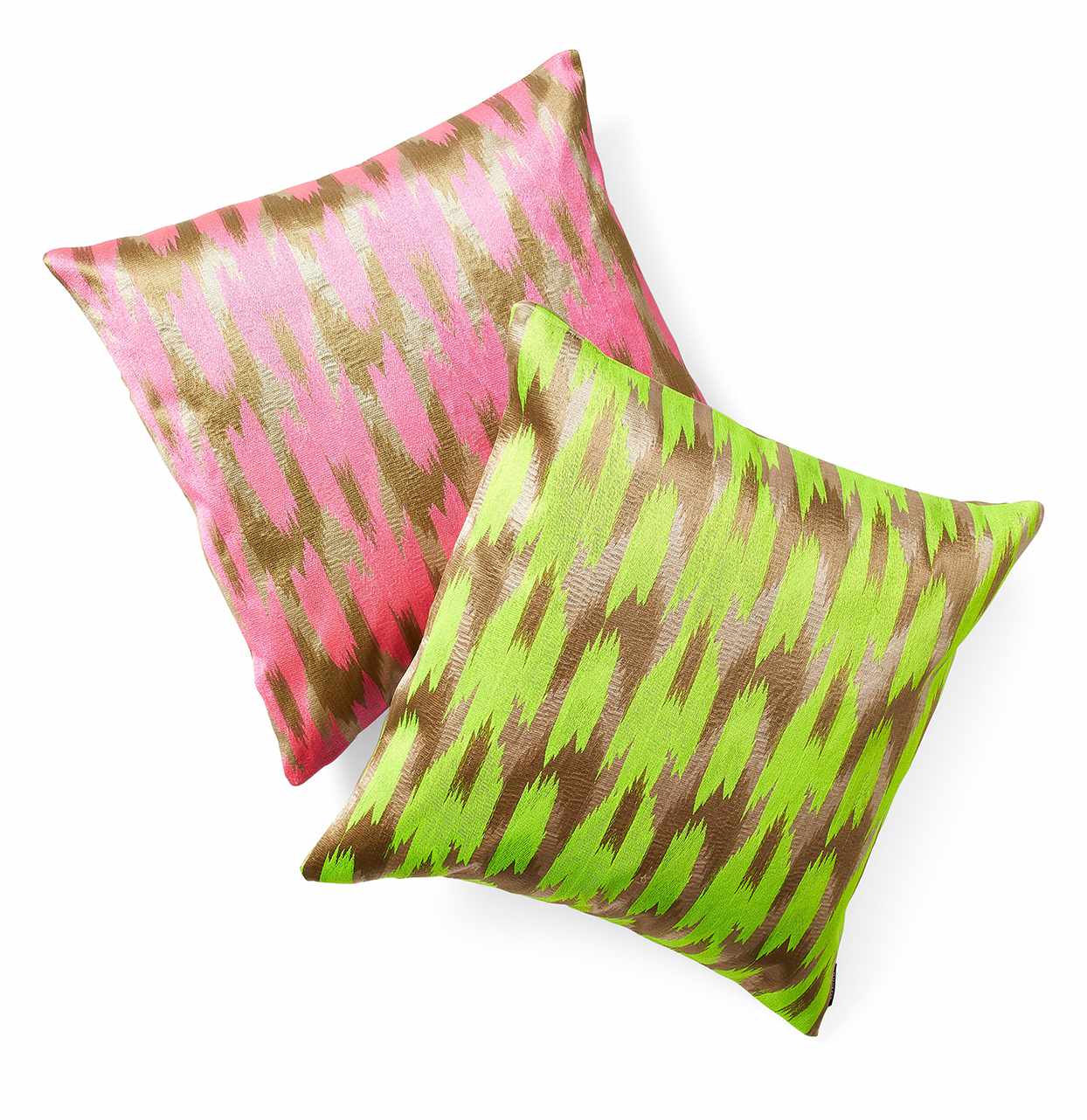 pink, green and gold patterned pillows