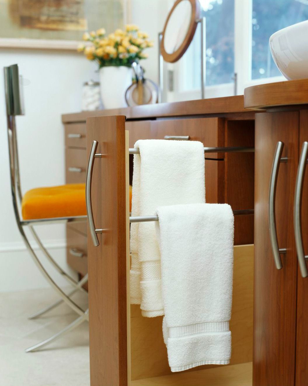 close-up of modern pull-out towel bar in vanity