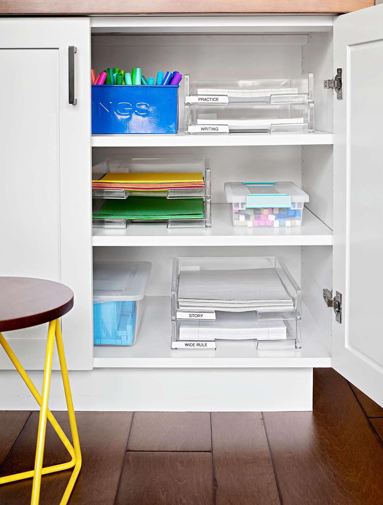 Cupboard with plastic organizers