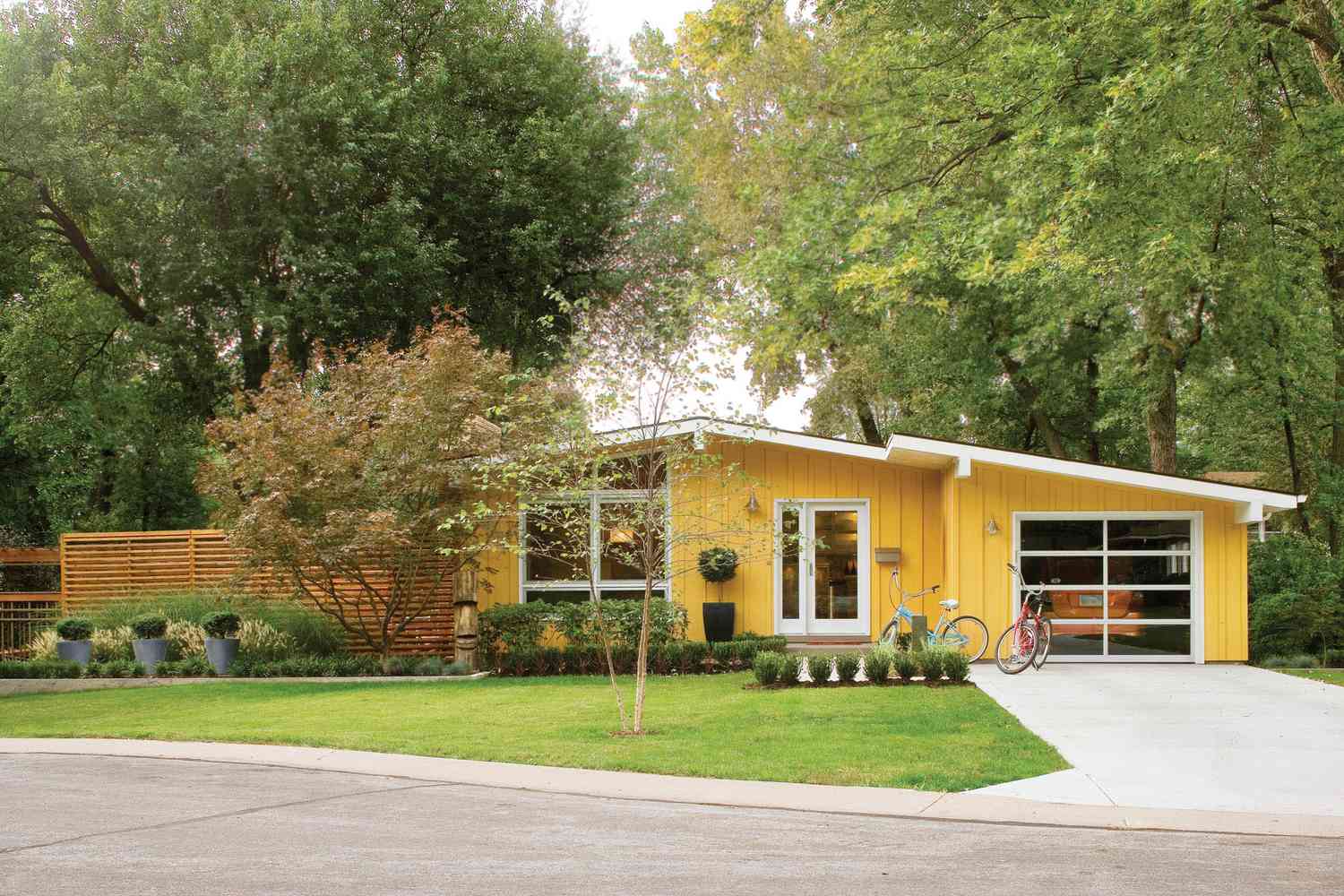 mustard-colored ranch house exterior