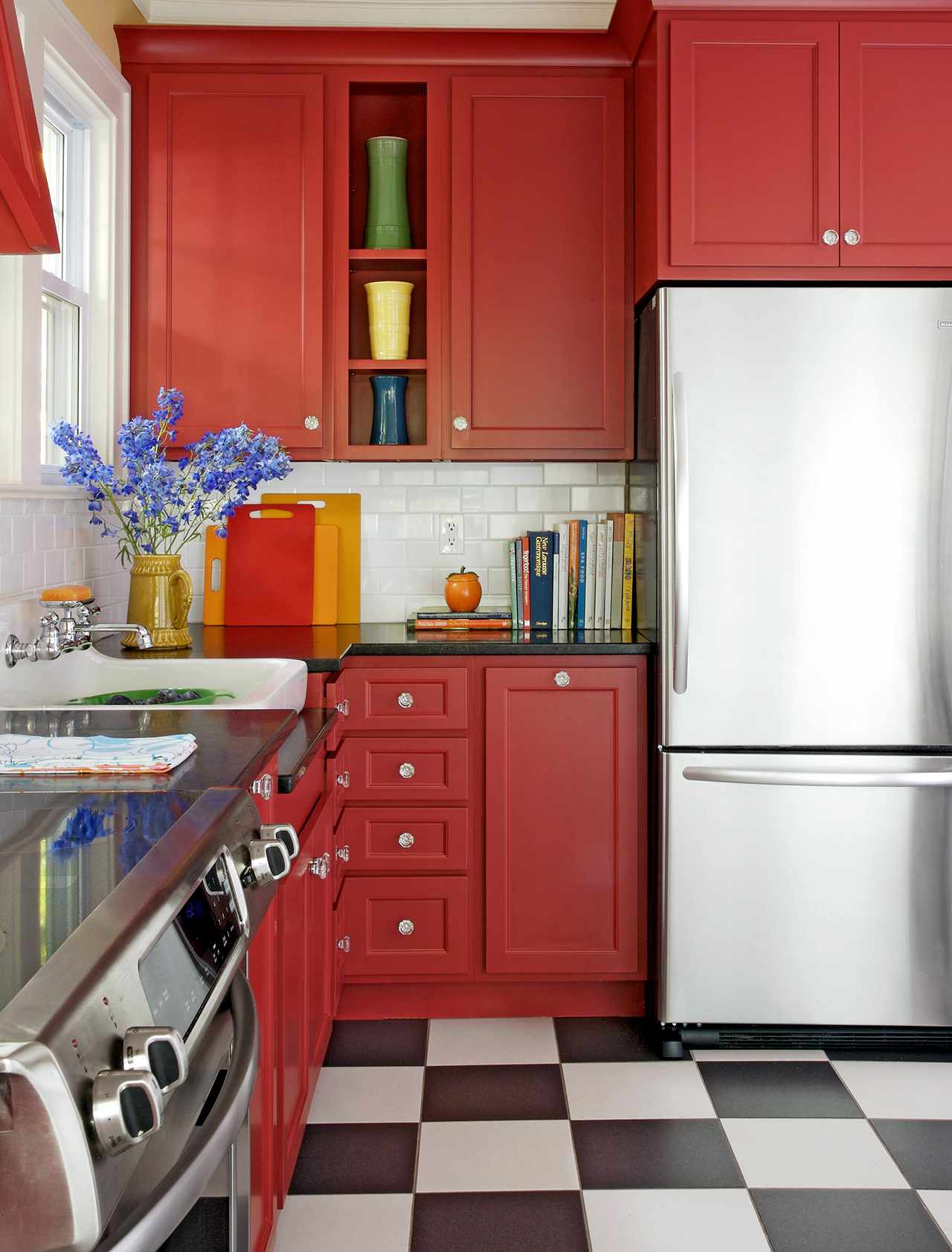 red kitchen cabinets stainless steel appliances